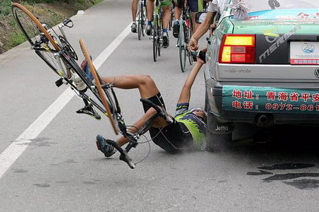 Biker Under Wheel